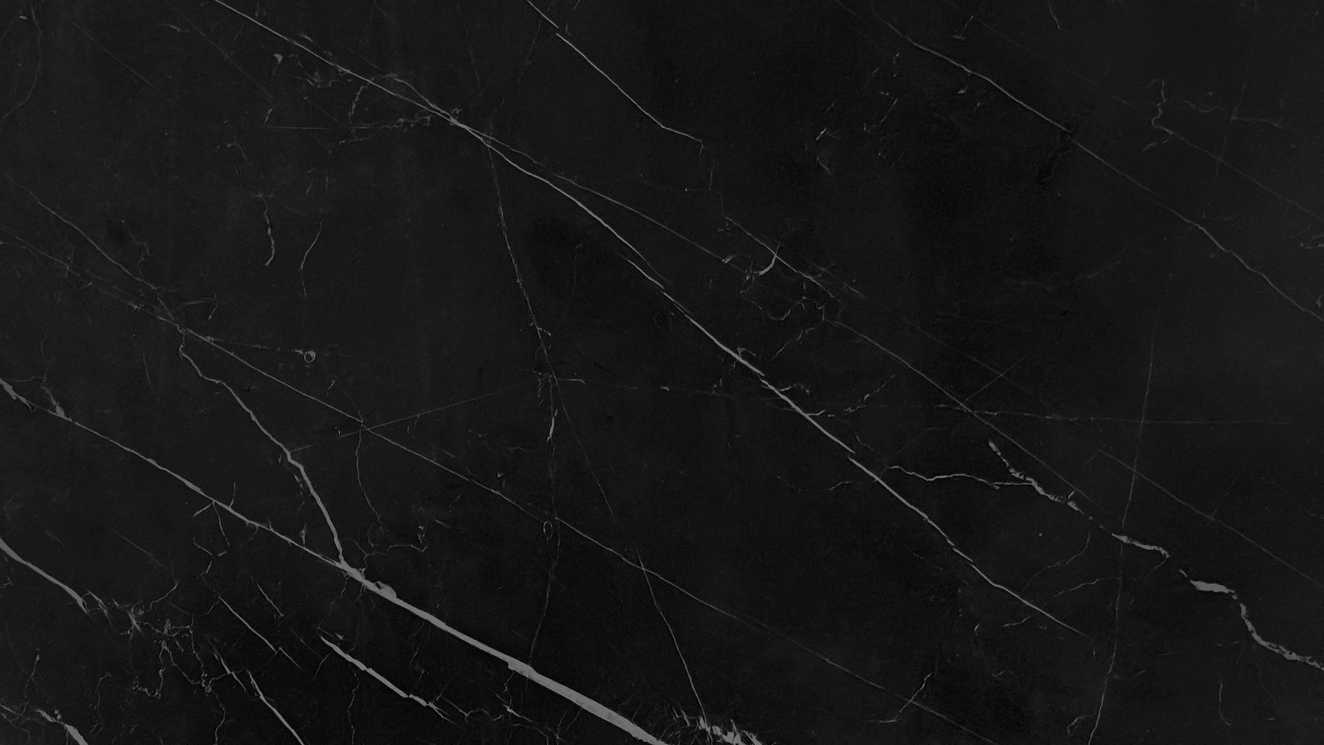 Dramatic black marble texture with white veins